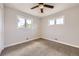 Inviting bedroom with natural light streaming through its two windows at 10712 Larson Dr, Northglenn, CO 80233