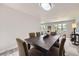 Spacious dining room with a large table, offering ample seating for entertaining guests at 10712 Larson Dr, Northglenn, CO 80233
