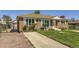 Attractive brick home featuring a well-kept lawn and long driveway at 10712 Larson Dr, Northglenn, CO 80233