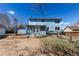 Expansive backyard of the two-story home, featuring a fenced area and access to the house at 2336 S Dawson Way, Aurora, CO 80014