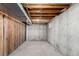 Unfinished basement with concrete walls and exposed ceiling is ready for your personalization at 2336 S Dawson Way, Aurora, CO 80014
