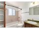 Bathroom with a tub and vanity at 2336 S Dawson Way, Aurora, CO 80014