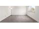 Bright, carpeted bedroom with a large window allowing lots of natural light at 2336 S Dawson Way, Aurora, CO 80014