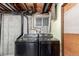 Modern laundry room featuring side-by-side washer and dryer at 2336 S Dawson Way, Aurora, CO 80014