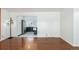 Hardwood floors, with view into kitchen, offers an open concept living space at 2336 S Dawson Way, Aurora, CO 80014