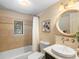 Classic bathroom with tiled shower, vanity with elegant fixtures, and soft lighting at 28268 Shadow Mountain Dr, Conifer, CO 80433