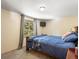Comfortable bedroom with natural light and neutral walls at 28268 Shadow Mountain Dr, Conifer, CO 80433
