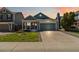 Charming single-Gathering home with a well-manicured lawn and inviting front porch at 7647 Elmwood St, Littleton, CO 80125
