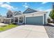 Charming single-Gathering home with a well-manicured lawn and inviting front porch at 7647 Elmwood St, Littleton, CO 80125