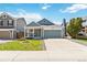 Charming single-Gathering home with a well-manicured lawn and inviting front porch at 7647 Elmwood St, Littleton, CO 80125
