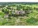 An aerial view of the property showcasing the privacy and large treed lot at 4725 Palmer Ridge Dr, Parker, CO 80134
