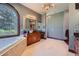 Luxurious bathroom with a soaking tub, a vanity, and tile floors at 4725 Palmer Ridge Dr, Parker, CO 80134