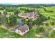 Desirable exterior of this home sitting on a large private lot with mature trees at 4725 Palmer Ridge Dr, Parker, CO 80134