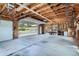 Spacious garage with high ceilings, perfect for storage and projects, with natural light streaming in at 4725 Palmer Ridge Dr, Parker, CO 80134