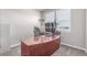 Home office showcasing a large desk, monitors, and natural light from windows at 525 Remington Dr, Hudson, CO 80642