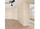 Spacious bedroom featuring wood-look floors and a ceiling fan at 17093 E Tennessee Dr # 211, Aurora, CO 80017