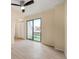 Bright living room with sliding door access to small outdoor space at 17093 E Tennessee Dr # 211, Aurora, CO 80017