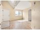 Inviting living room with hardwood floors, a bright window, and plenty of natural light at 17093 E Tennessee Dr # 211, Aurora, CO 80017
