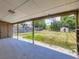 Covered back porch overlooking large fenced back yard, great for entertaining at 235 S Stuart St, Denver, CO 80219