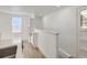 Bright hallway with built-in cabinets and a partial view into the kitchen area at 235 S Stuart St, Denver, CO 80219
