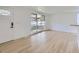 Bright living room with large windows offering natural light and views of the front yard at 235 S Stuart St, Denver, CO 80219