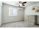 Bedroom with ceiling fan, carpet, and murphy bed at 2254 S Eagle St, Aurora, CO 80014