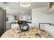 Open-concept dining area leads into the living room, creating an inviting space at 2254 S Eagle St, Aurora, CO 80014