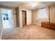 Bedroom with carpet, closet, and natural light from the window at 6686 Solana Dr, Castle Pines, CO 80108