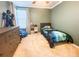 Comfortable ' bedroom with playful decor, dresser, and ample natural light at 6686 Solana Dr, Castle Pines, CO 80108