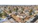 An aerial shot showcases the home's position in a quiet neighborhood with mountain views at 13131 Mercury Dr, Lone Tree, CO 80124