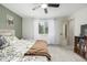 Comfortable main bedroom features an updated ceiling fan, soft carpet, and neutral paint at 11886 Birch Dr, Thornton, CO 80233