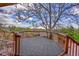 Outdoor back deck area with wooden beams and a nice view at 11157 W Marlowe Ave, Jefferson, CO 80127