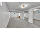 Finished basement with carpeted floors, a mirrored closet, and nearby bathroom at 11157 W Marlowe Ave, Jefferson, CO 80127