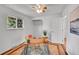 Bright room with wood flooring, perfect for a home office, featuring a large window and closet at 11157 W Marlowe Ave, Jefferson, CO 80127