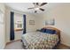 Cozy bedroom with carpet flooring, a window for natural light, and stylish decor at 13151 Ivanhoe St, Thornton, CO 80602