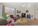 Inviting living room with ample seating, natural light, and a relaxed atmosphere at 13151 Ivanhoe St, Thornton, CO 80602
