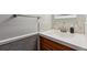 Modern bathroom featuring a vanity with a sink, decorative backsplash, and wood cabinets at 4693 Chatham St, Boulder, CO 80301