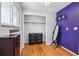 Bright bedroom with hardwood floors, a closet with dresser, and a decorative full-length mirror at 4693 Chatham St, Boulder, CO 80301