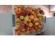 Bin full of locally sourced peaches at 4693 Chatham St, Boulder, CO 80301