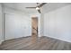 Open bedroom with closet and staircase, wood floors and lots of light at 3481 W 63Rd Ave, Denver, CO 80221