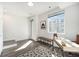 Bright and airy office with modern desk, large window, and convenient access to the outside at 3481 W 63Rd Ave, Denver, CO 80221