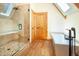 Bathroom with glass enclosed shower and free standing tub at 297 Robertson Ln, Breckenridge, CO 80424