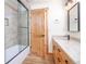 Modern bathroom featuring a glass-enclosed shower, wooden vanity, and stylish fixtures for a luxurious feel at 297 Robertson Ln, Breckenridge, CO 80424