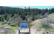 Northstar Village entrance sign surrounded by trees, streams, and natural landscapes at 297 Robertson Ln, Breckenridge, CO 80424