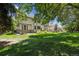 Exterior view of the backyard showcasing the home and outdoor living space at 6393 S Jamaica Ct, Englewood, CO 80111