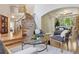 Inviting living room with a staircase, hardwood floors and comfortable seating area bathed in natural light at 6393 S Jamaica Ct, Englewood, CO 80111