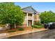 Well-maintained condo building with mature trees and attractive landscaping at 8200 E 8Th Ave # 5-204, Denver, CO 80230