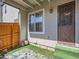 Inviting back patio with artificial turf, rug, and fence for a cozy outdoor space at 2301 E Fremont Ave # W03, Centennial, CO 80122