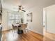 Cozy dining area featuring a modern table setting, wicker chairs, and a ceiling fan at 2301 E Fremont Ave # W03, Centennial, CO 80122