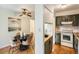 Open concept with view to dining area, showcasing stylish accents and bright, natural light at 2301 E Fremont Ave # W03, Centennial, CO 80122